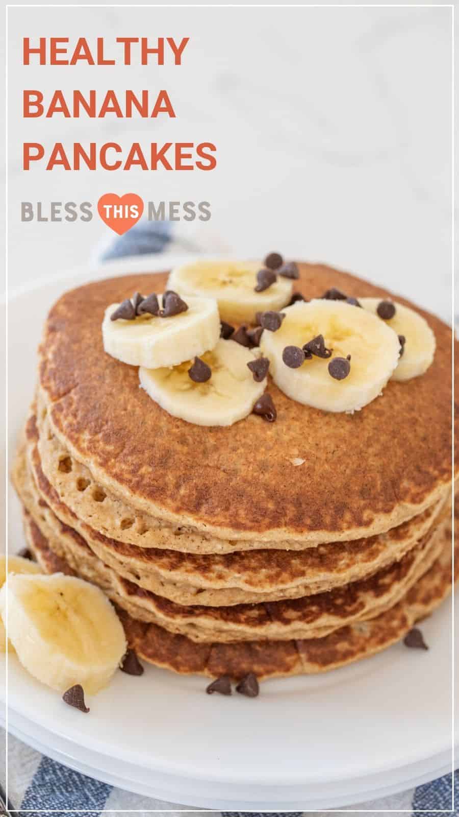stack of healthy banana pancakes topped with banana slices and chocolate chips
