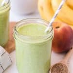 a green smoothie in a wide mouth mason jar