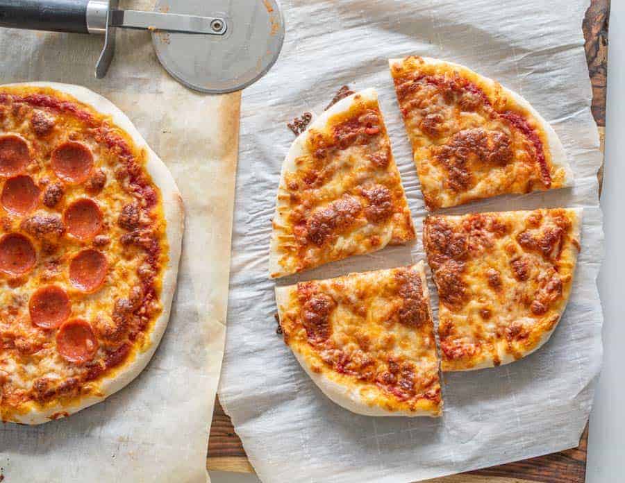 cheese sourdough pizza and pepperoni sourdough pizza