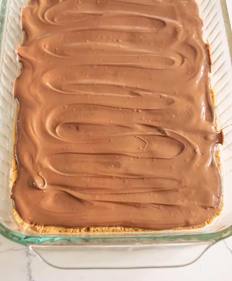 pan of cookie bars with chocolate on top no cut