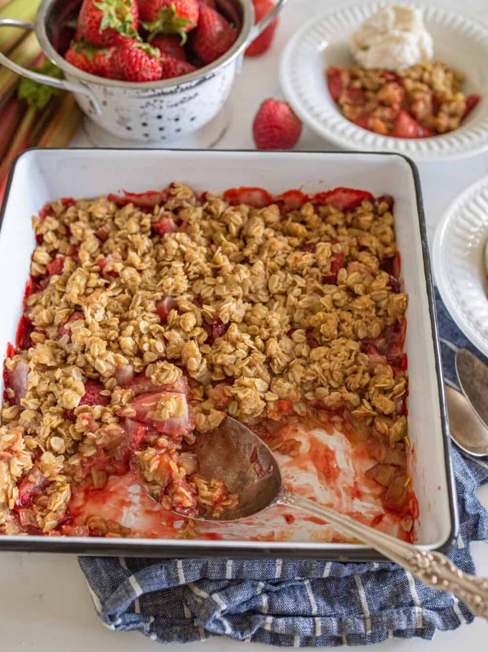 crisp being served from pan with silver spoon