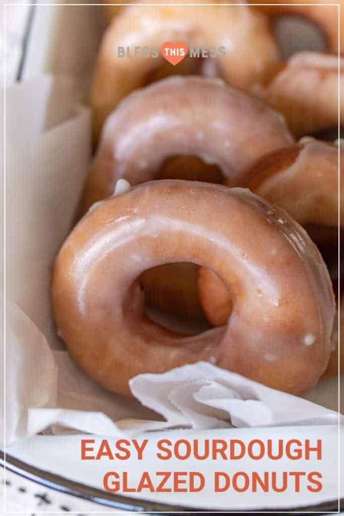 closeup of sourdough glazed donuts on parchment