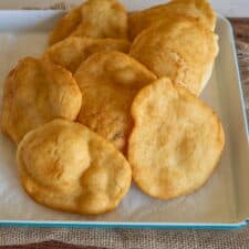 fry bread stacked on a dish