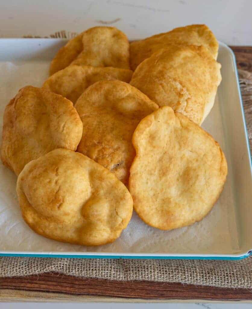 fry bread stacked on a dish