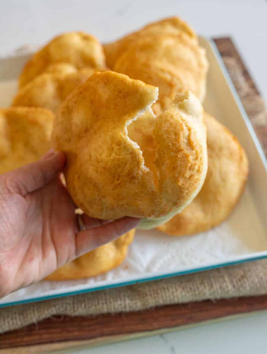 fry bread broken open so you can see the pocket inside, it's very fluffy