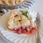 lattice pie crust strawberry rhubarb pie dished out on a plate