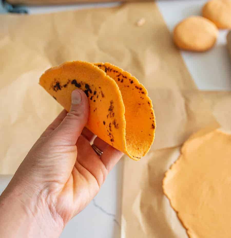 flexible tortilla being bent in hand