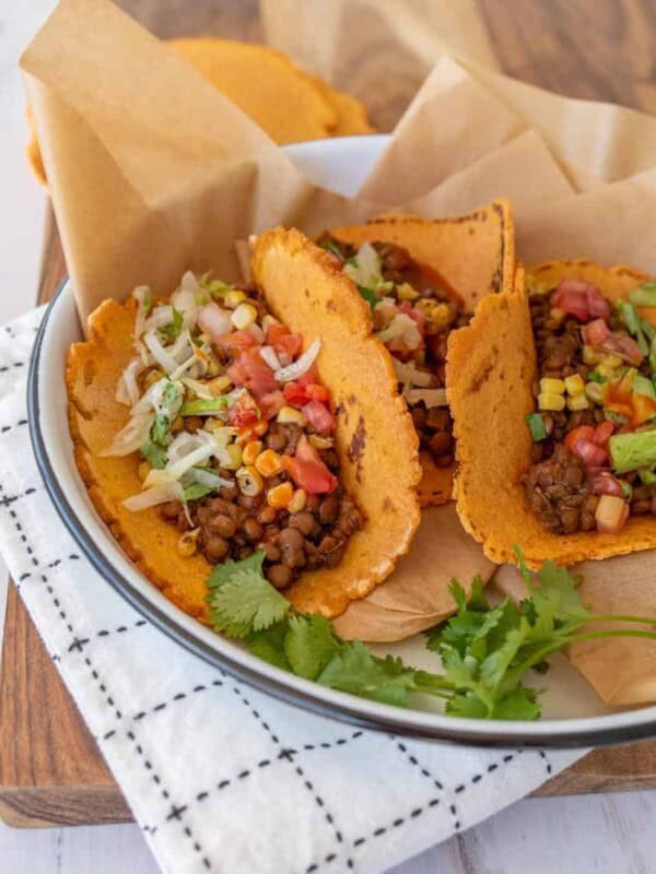 close up of sweet potato tacos in white pan