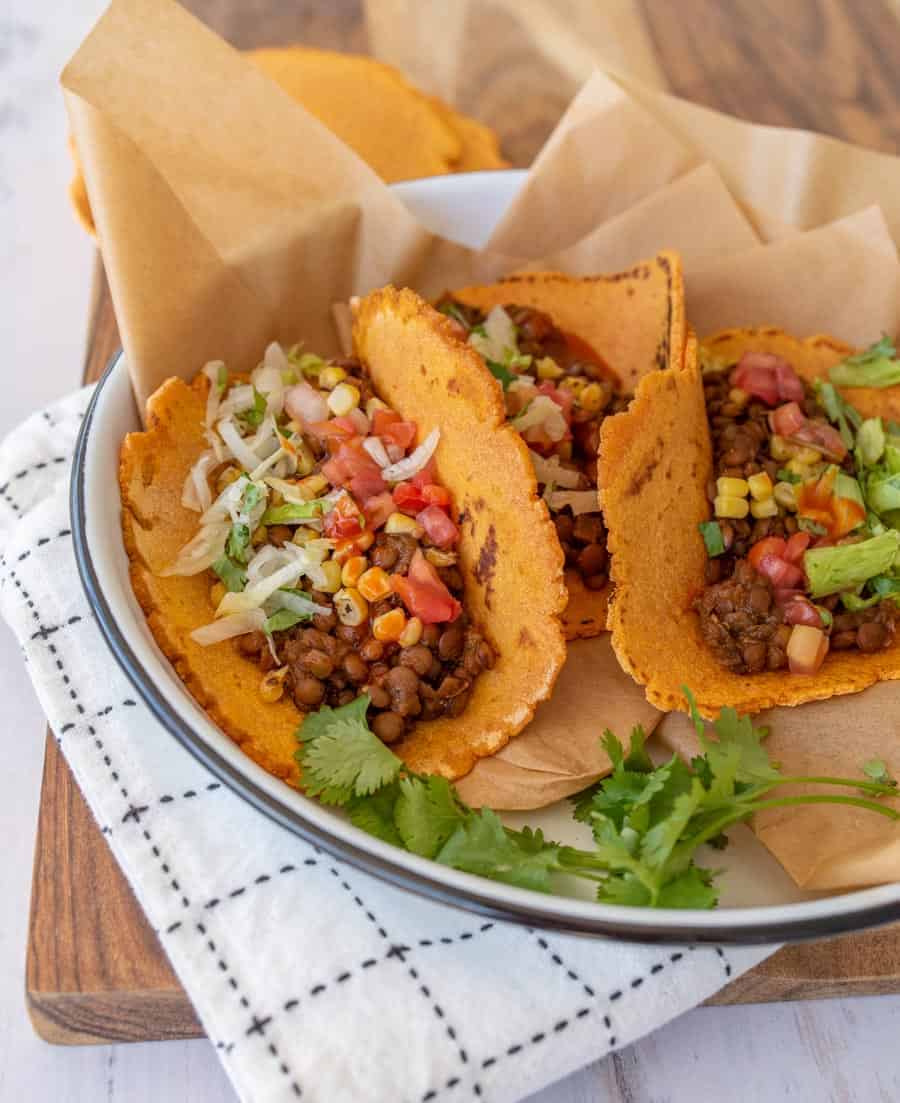 close up of sweet potato tacos in white pan