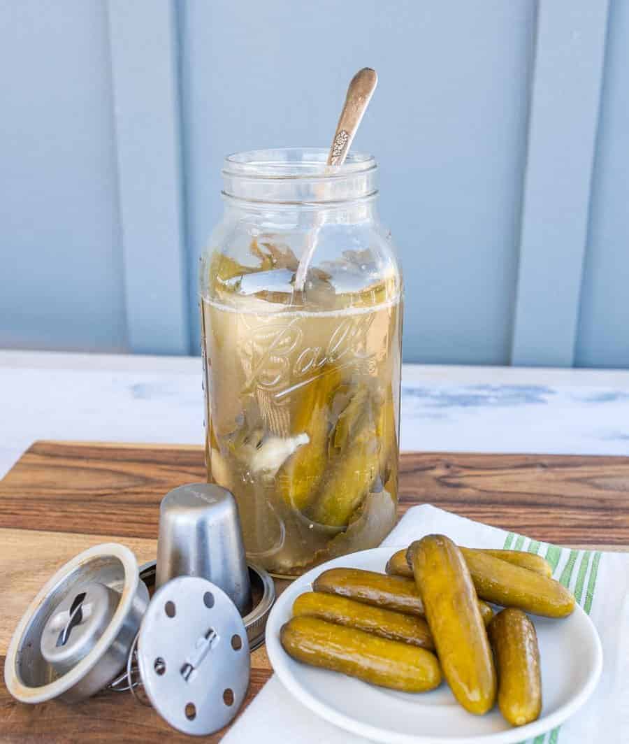 pickles on a plate and in a jar