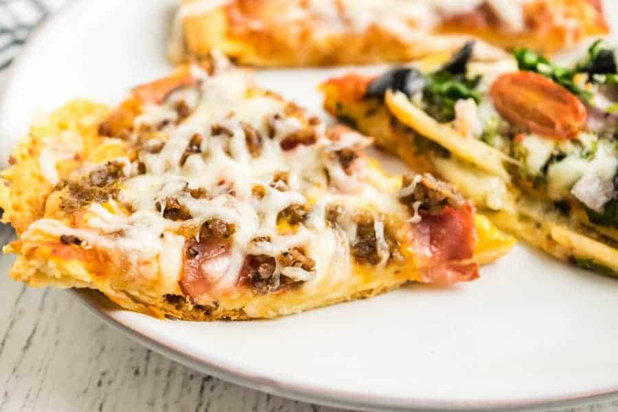 close up of sausage - 3 kinds of cooked flatbread pizza