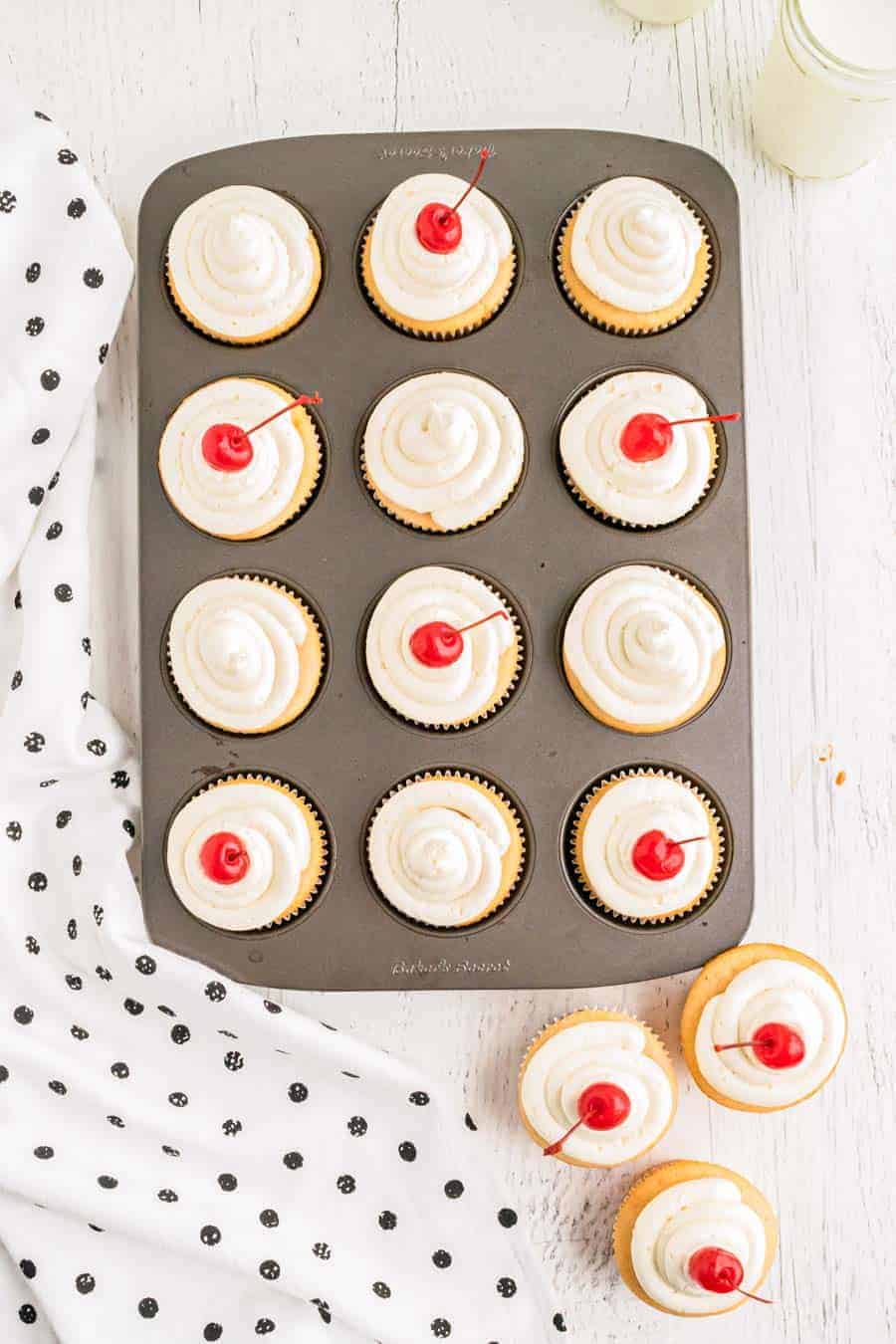 cherry chip cupcakes in muffin tin