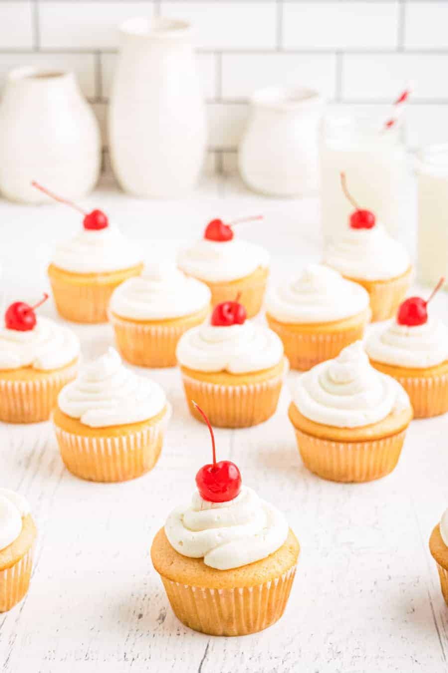 cluster of cupcakes on countertop