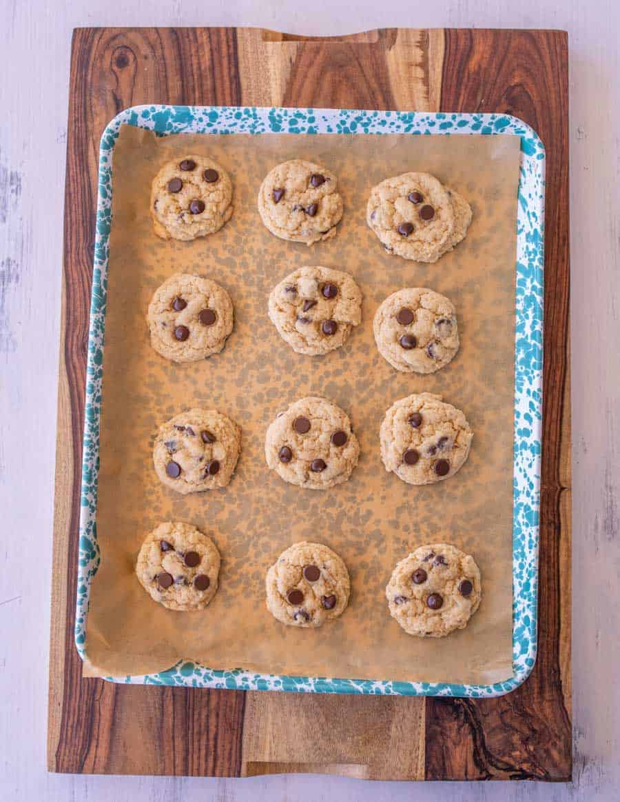 baked cookies on a blue and white speckled pan