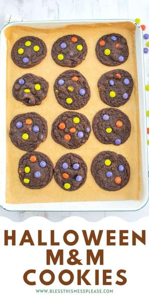 Halloween M&M cookies on baking sheet with text on the image