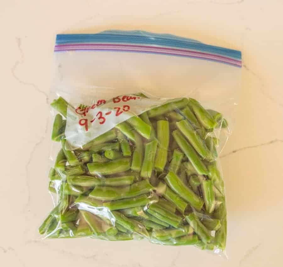 green beans in plastic freezer bag with date