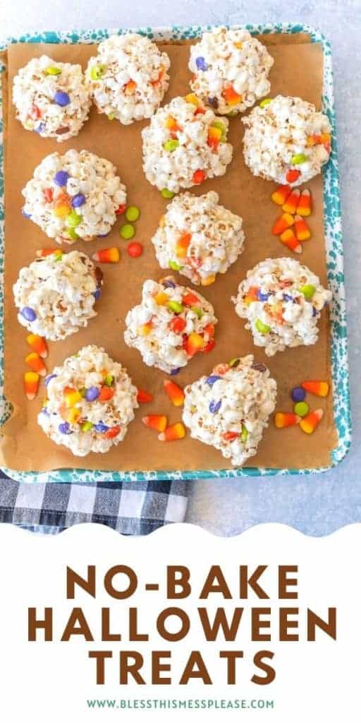 no bake halloween popcornballs and candy corn on a baking sheet