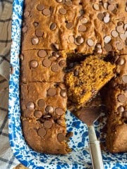 pumpkin cake in blue pan, cut in pieces