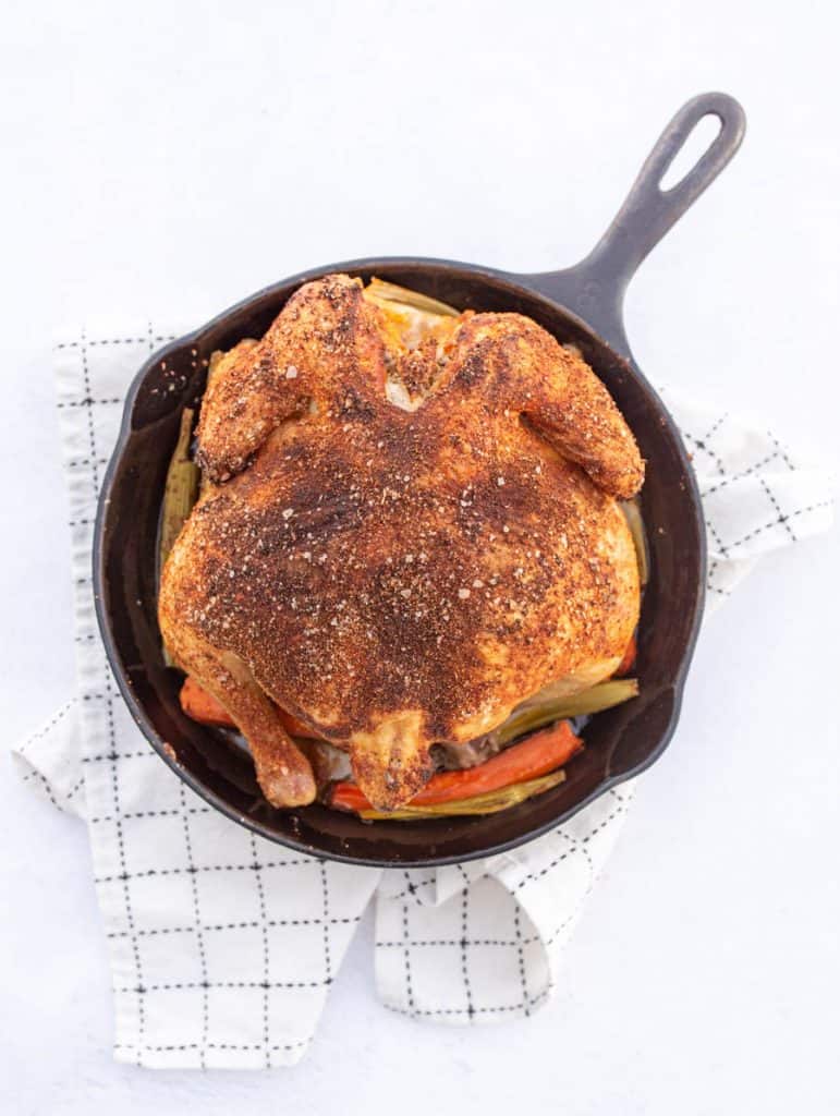 whole roasted chicken in cast iron skillet