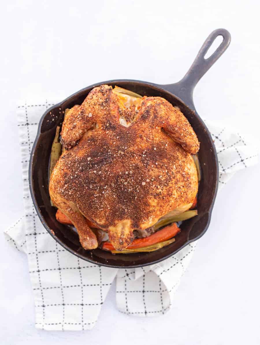 whole roasted chicken in cast iron skillet