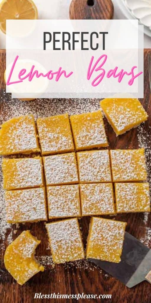 Top view of lemon bars cut into squares on a wood cutting board with the words "perfect lemon bars" written on the top