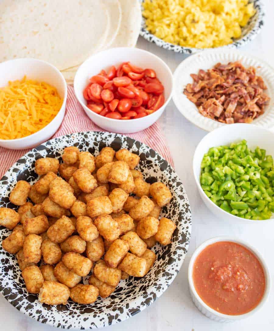 breakfast burrito ingredients in bowls