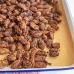 candied almonds on a baking sheet