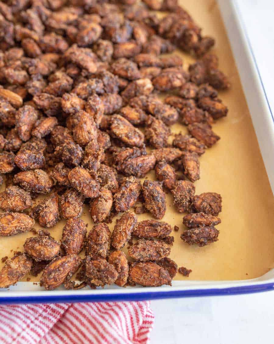 candied almonds on a baking sheet