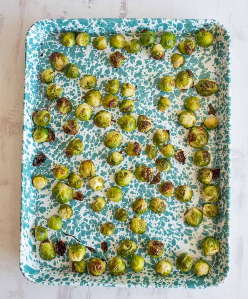 roasted brussel sprouts on a baking sheet