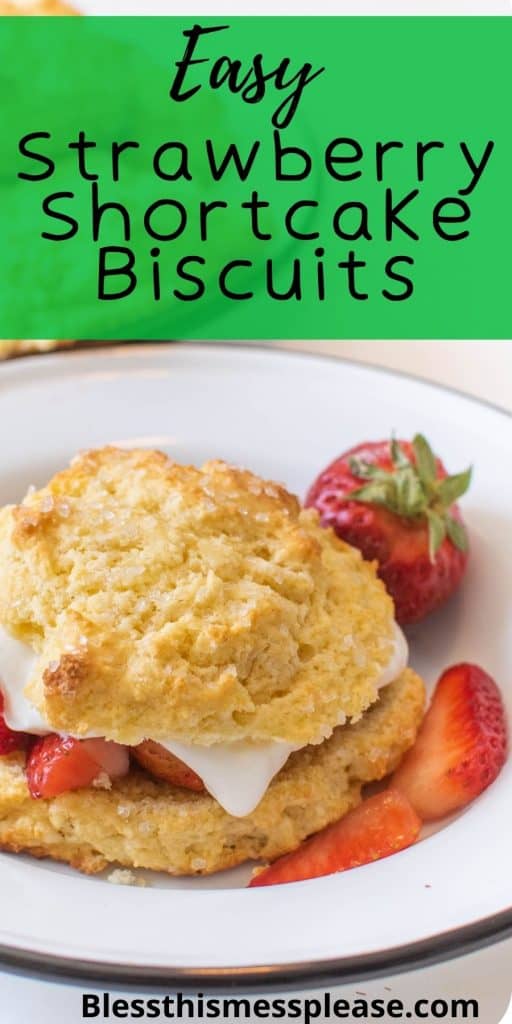 Photo of a bowl with a shortcake biscuit with sliced strawberries and whipped cream with the words "easy strawberry shortcake biscuits" written at the top