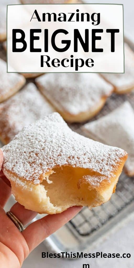 picture of a hand holding a beignet with a bite taken out of it and the words "amazing beignet recipe" written at the top