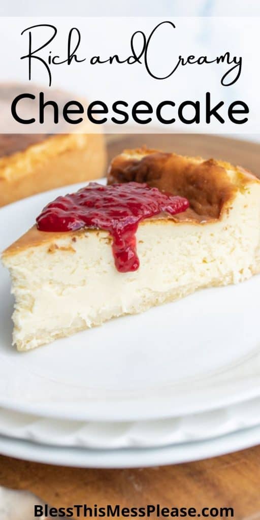 slice of cheesecake on a plate with raspberry sauce on a plate with the words "rich and creamy cheesecake" written at the top