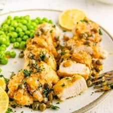 up close picture of a plate of chicken picatta