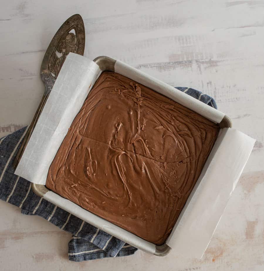 Top view of a pan of uncut chocolate fudge.