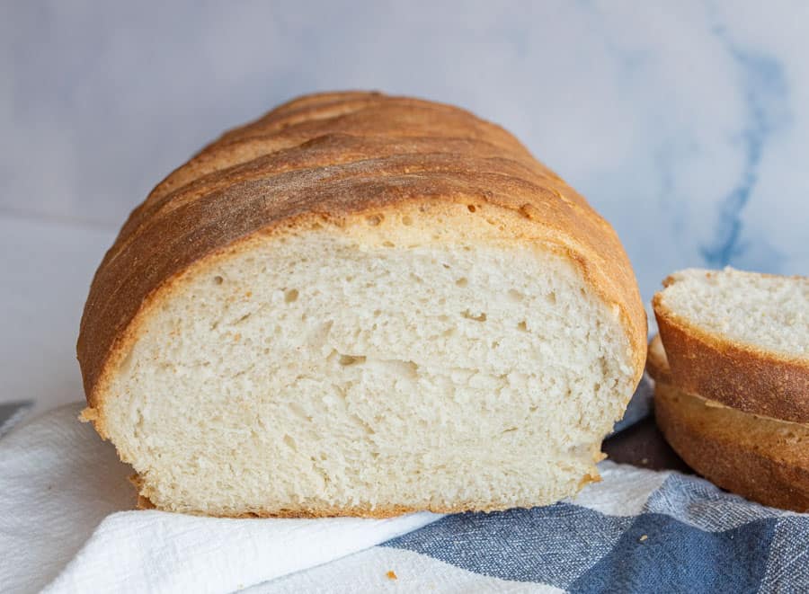 close up of a loaf of Italian bread that has been cut into