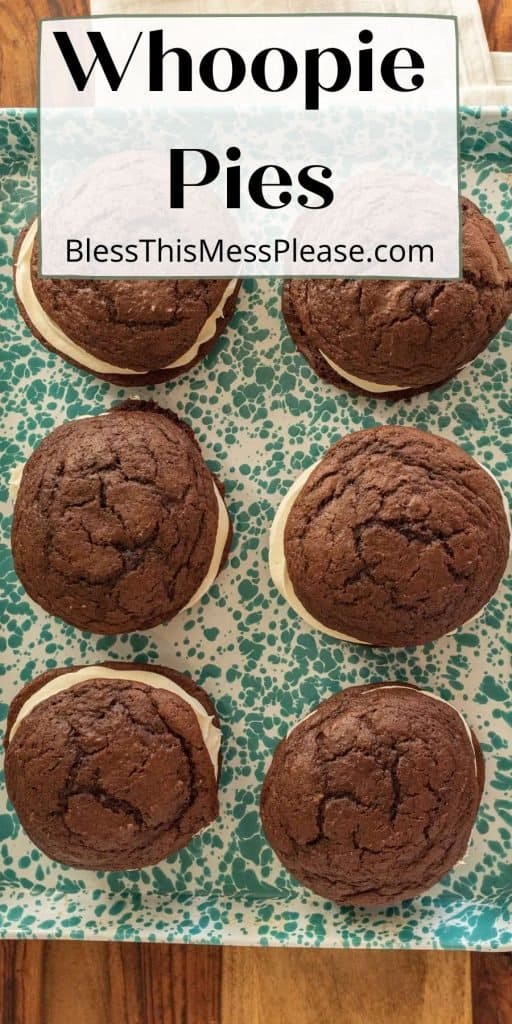 top view of a pan of whoopie pie cookie sandwiches with the words "whoopie pies" written at the top