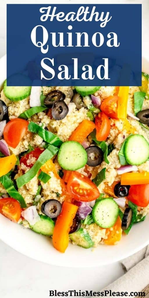 Top view of a bowl of quinoa salad with the words "healthy quinoa salad" written at the top
