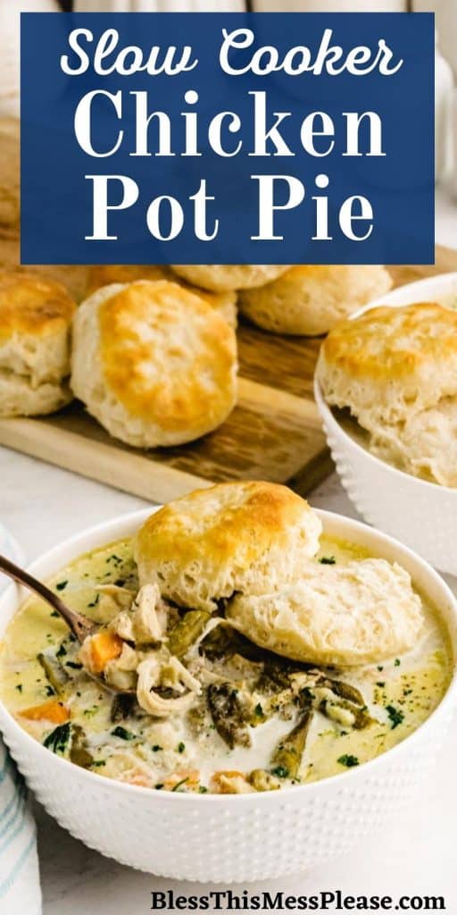 bowl of chicken pot pie with a biscuit on top and biscuits in the background with the words "slow cooker chicken pot pie" written on it