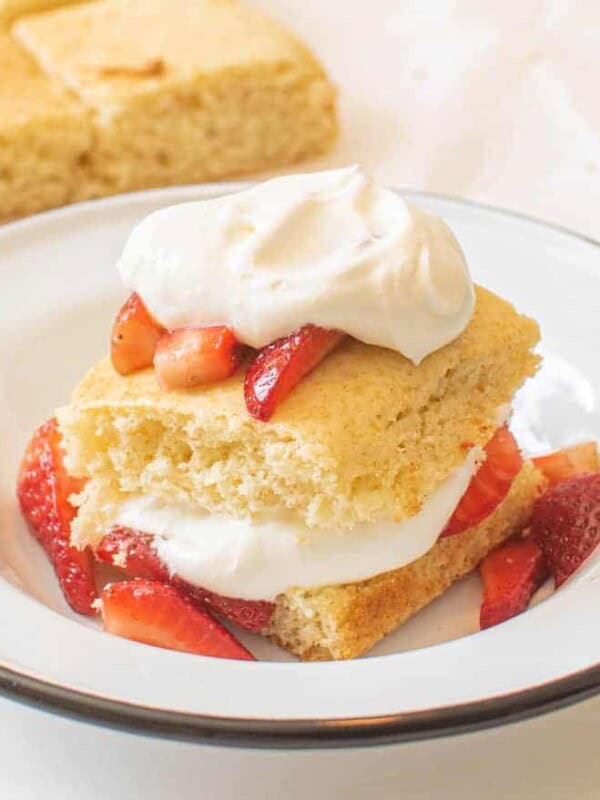 strawberries on a dense shortbread crust and whipped cream.