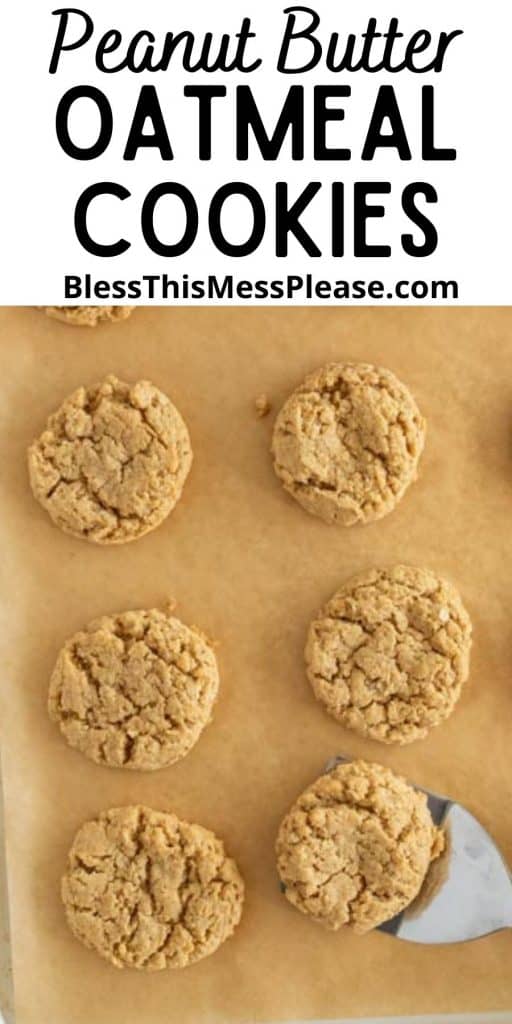 top view of a baking sheet of peanut butter oatmeal cookies with the words "peanut butter oatmeal cookies" written at the top