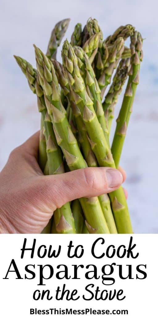 picture of a hand holding asparagus with the words "how to cook asparagus on the stove" written at the bottom