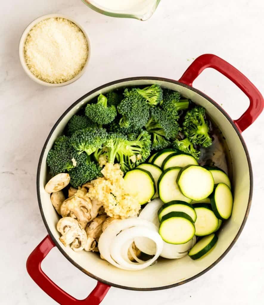 top view of a pot filled with the ingredients for pasta primavera