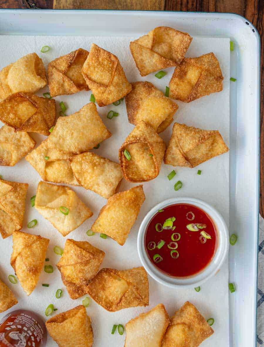 top view of a tray of cream cheese wontons.