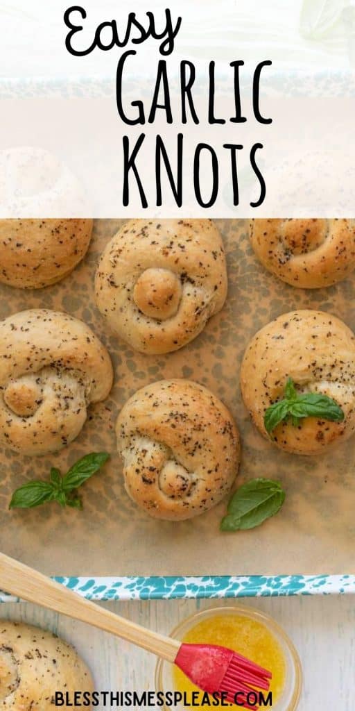 top view of garlic knots on a baking sheet with the words "easy garlic knots" written at the top