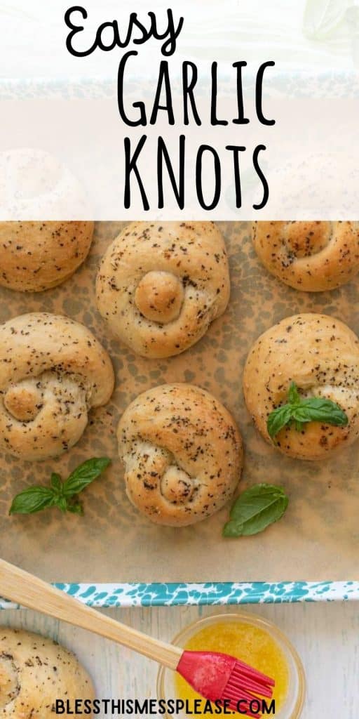 top view of garlic knots on a baking sheet with the words "easy garlic knots" written at the top