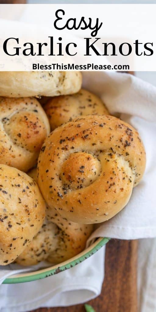 garlic knots in a bowl with the words "easy garlic knots" written at the top