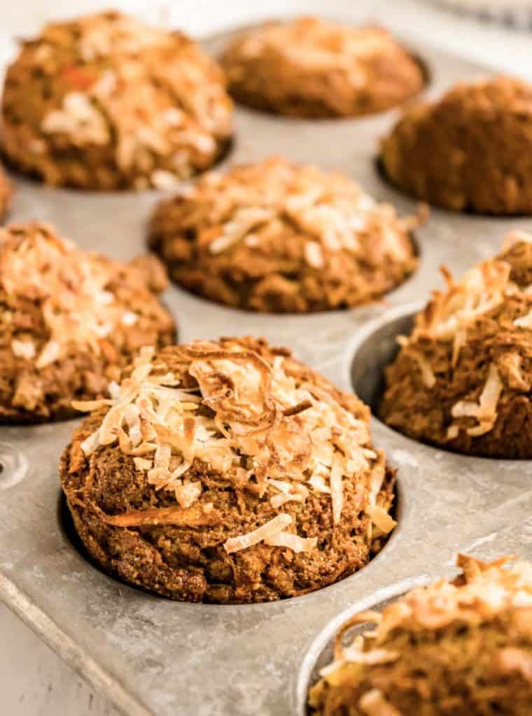 close up picture of morning glory muffins in a tin