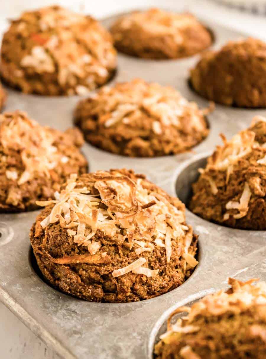 close up picture of morning glory muffins in a tin