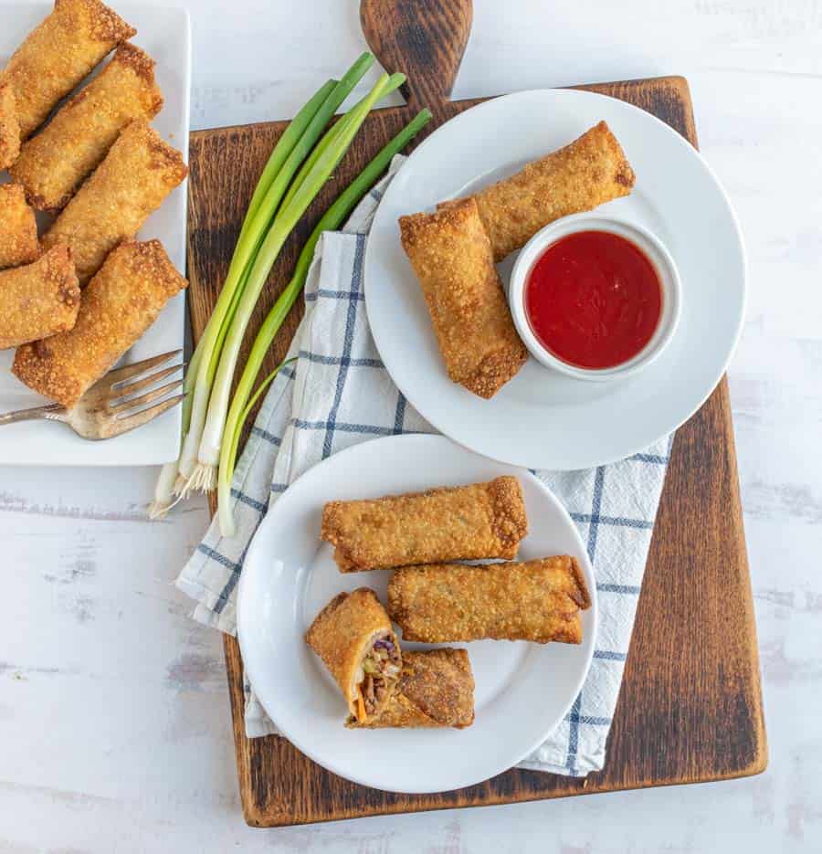 top view of egg rolls on plates