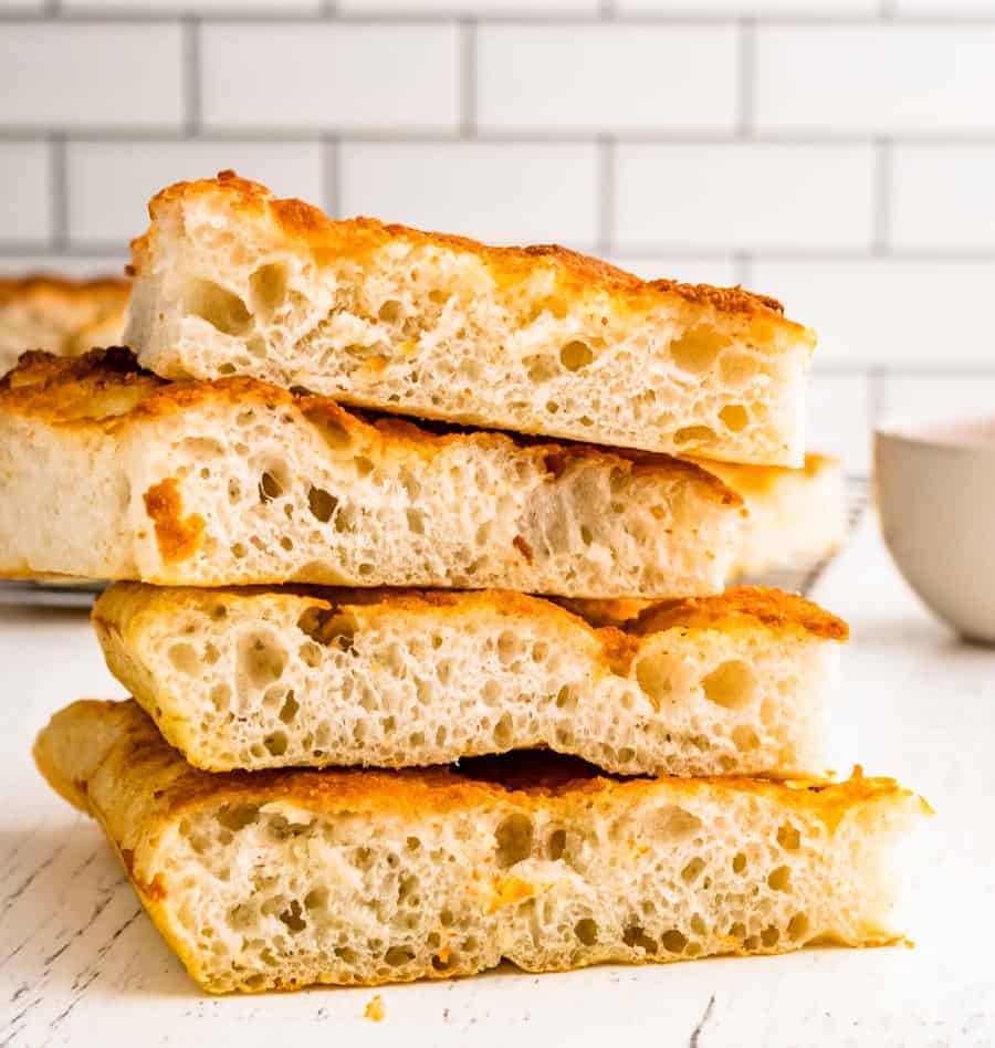 slices of focaccia bread stacked on top of each other